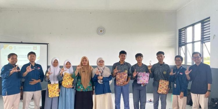 PKM Dosen Sistem Informasi Tingkatkan Literasi Digital di SMA N 1 Lebak Wangi